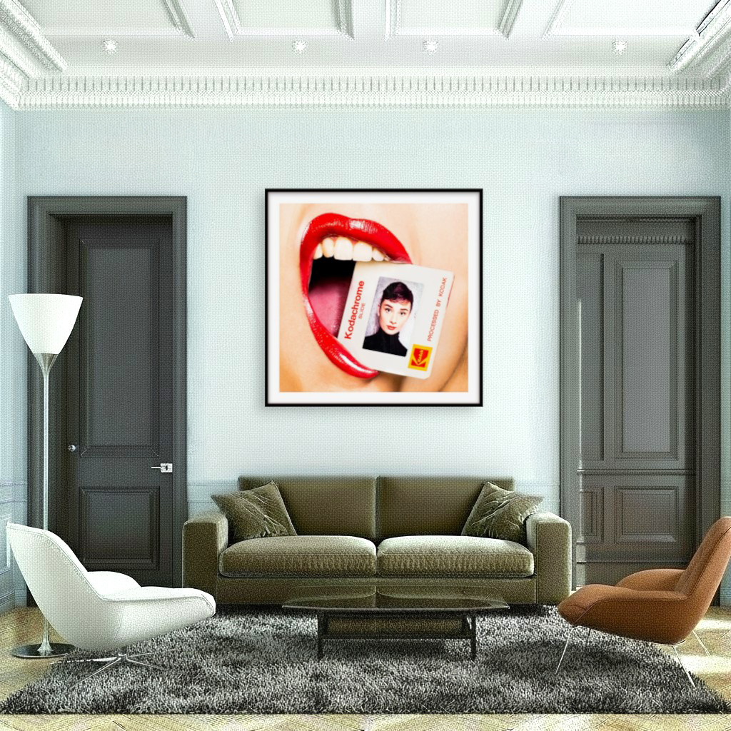 Interior with Audrey Hepburn Kodachrome artwork of a woman with red lips holding a slide of the iconic actress between her teeth.