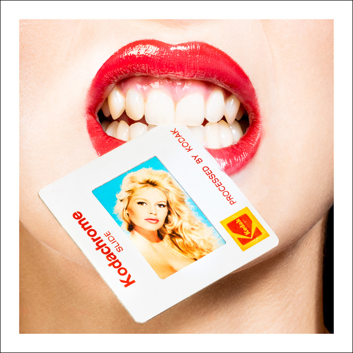 Brigitte Bardot Kodachrome artwork of a stylish woman with red lips holding a photo of the iconic actress gently between her teeth.