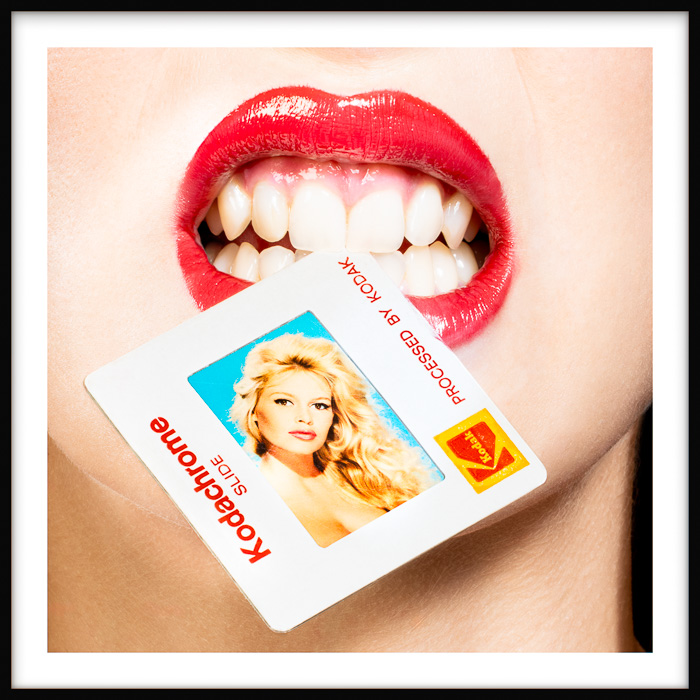 Brigitte Bardot Kodachrome artwork of a stylish woman with red lips holding a photo of the iconic actress gently between her teeth.