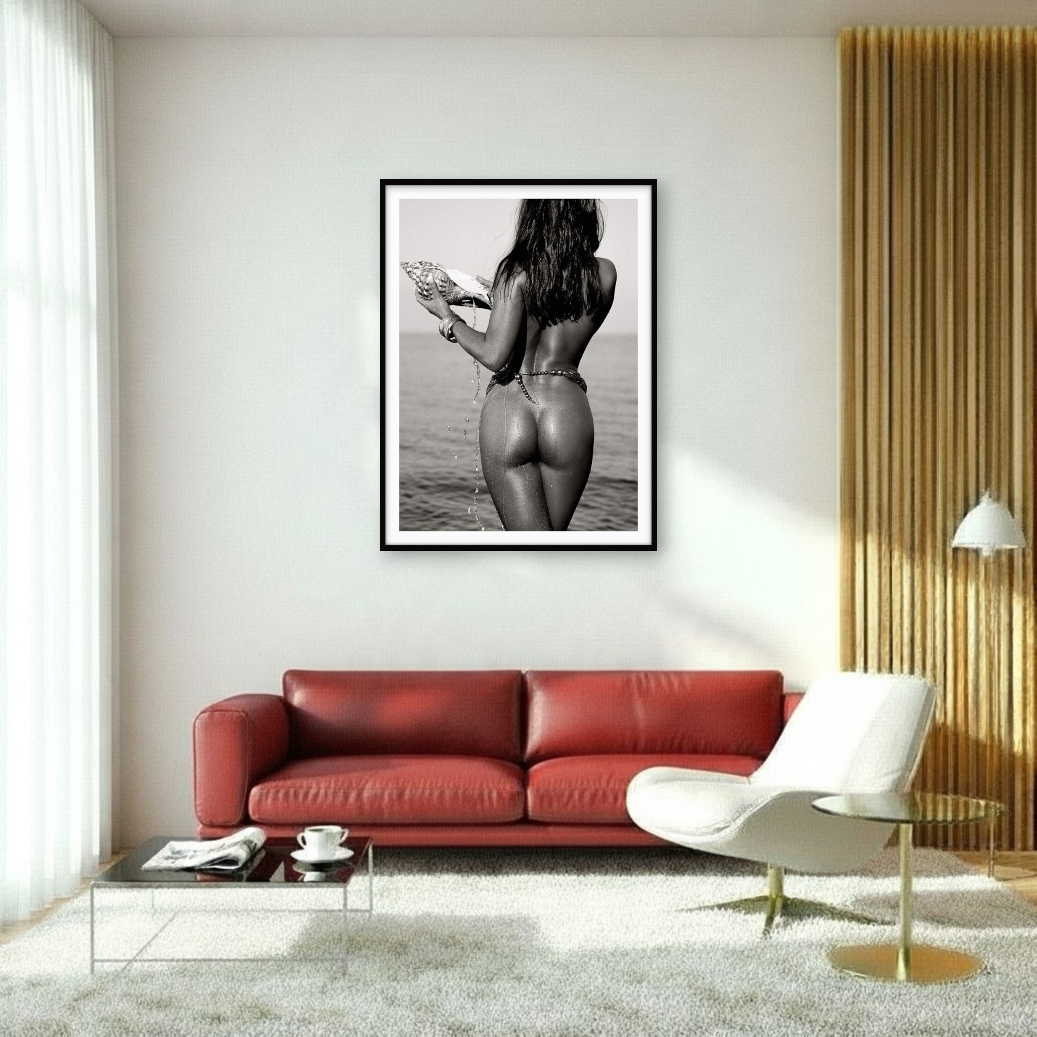 Art in room of nude woman by the sea with a shell, expressing sensuality in B/W photography with radiant skin and flowing water.